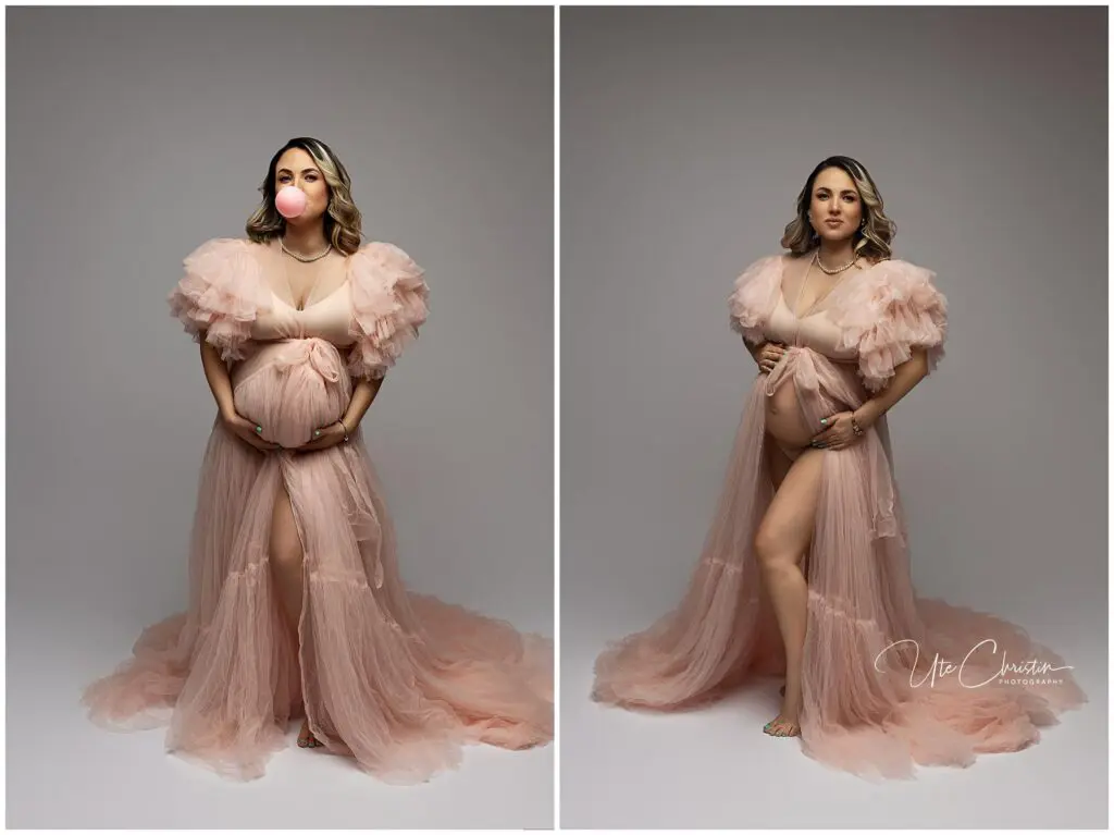 A pregnant woman poses in a sheer pink tulle gown with puffed sleeves. In the left image, she blows a bubblegum bubble; in the right, she holds her belly and parts the gown to reveal her leg. Both photos have a gray background.