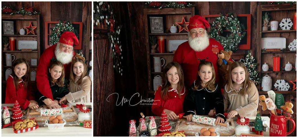 Three smiling girls bake cookies at a festive kitchen table with Santa Claus. Holiday decorations, baking supplies, and Christmas treats fill the cozy, warmly lit scene.