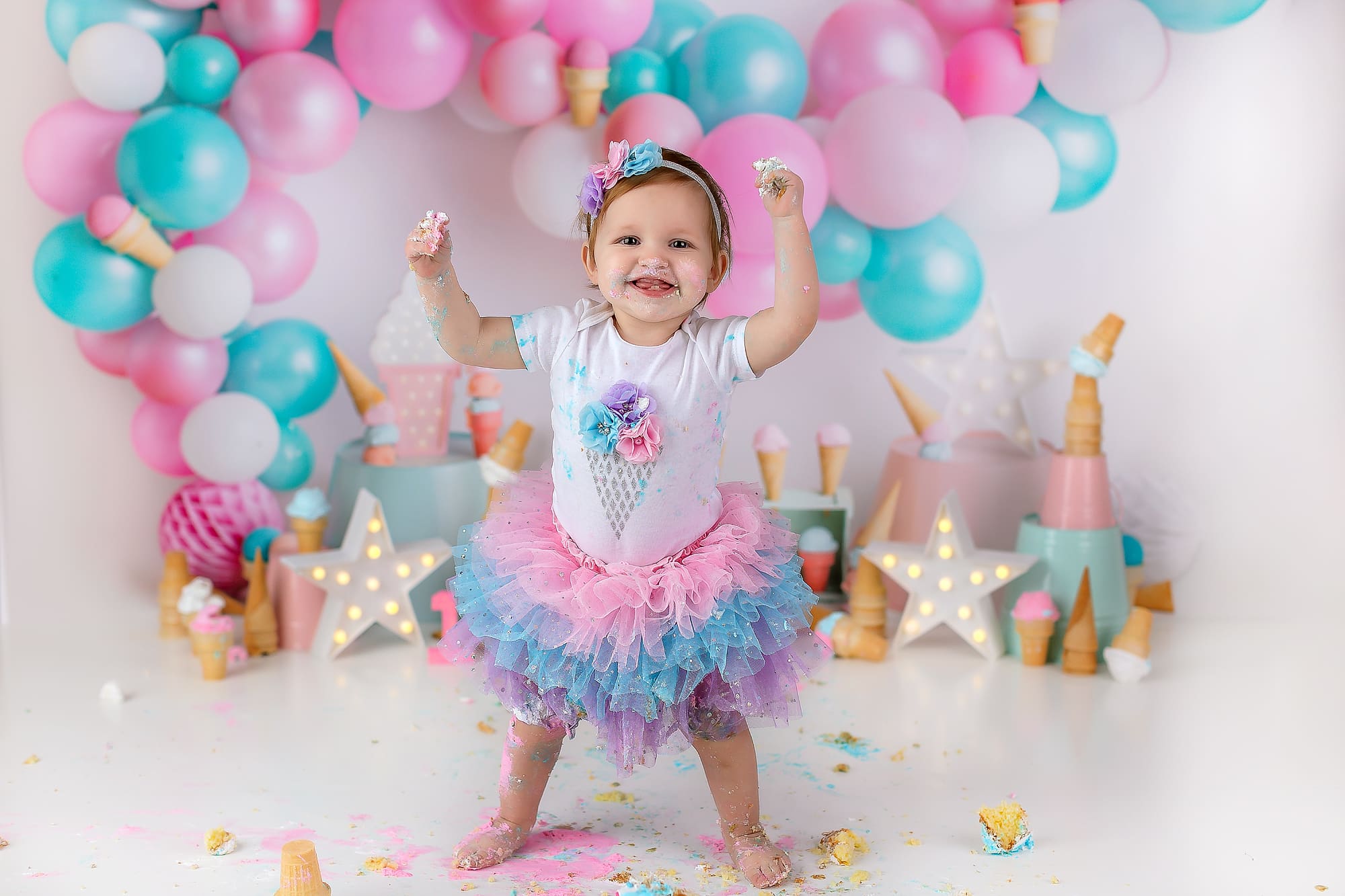 adorable one year old during her ice cream cakesmash