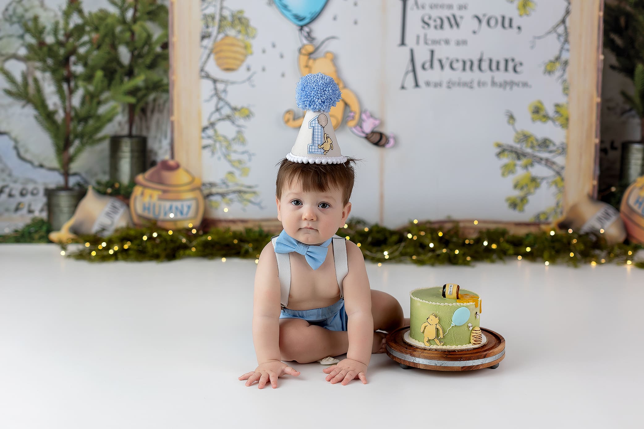 cute little boy smashing cake