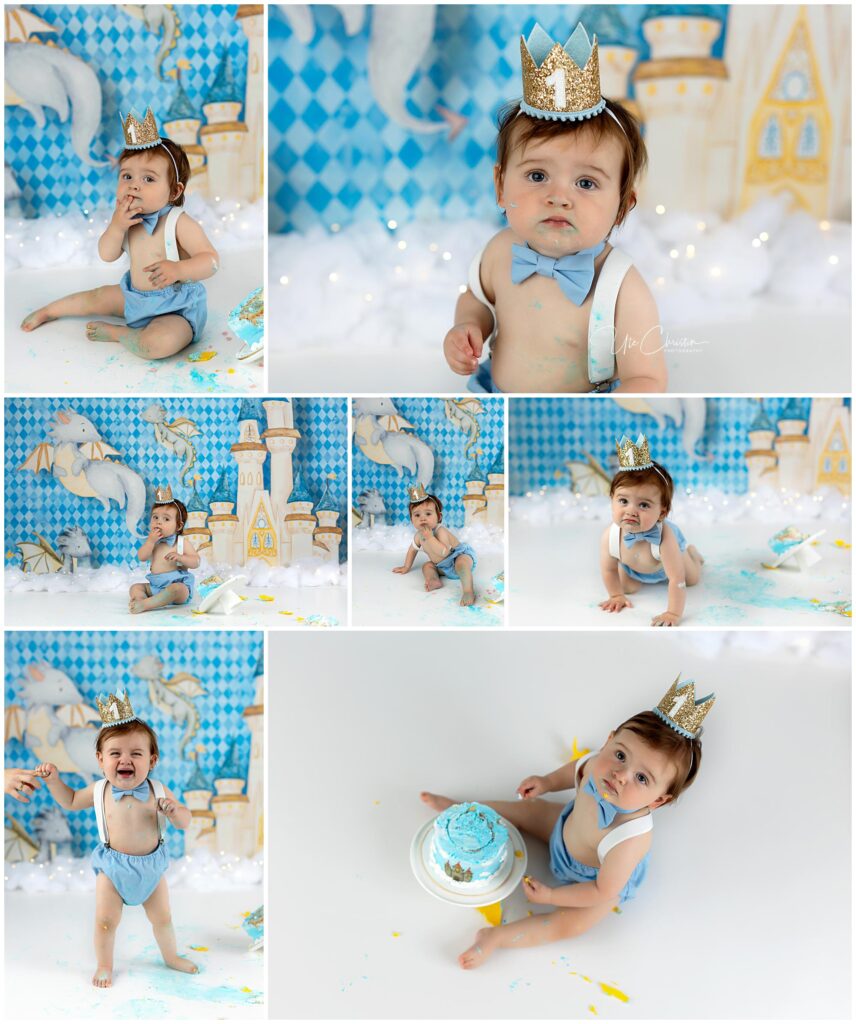 A baby wearing a gold crown, blue bow tie, and suspenders poses in a whimsical castle-themed setting, eating blue cake and smiling in various poses for a cake smash photo shoot.